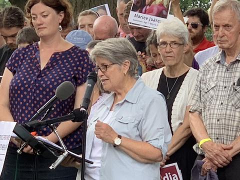 LCWR staff member Sister Ann  Scholz, SSND leads part of the prayer in DC